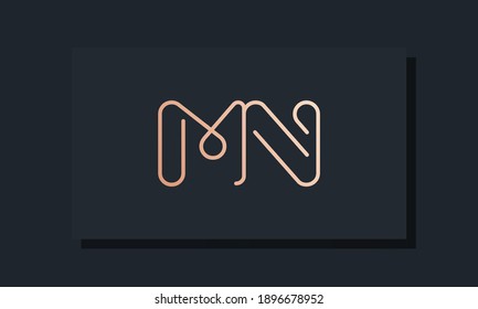 Minimal clip initial letter MN logo. This logo inspiration from clip typeface.It will be suitable for which company or brand name start those initial.
