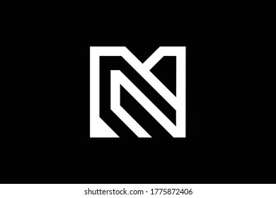 Minimal elegant monogram art logo. Outstanding professional trendy awesome artistic M MN NM initial based Alphabet icon logo. Premium Business logo. White color on black background