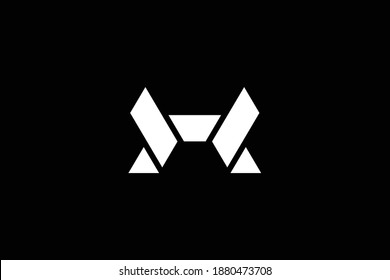 Mínimo y elegante logotipo de arte en monograma. Destacado profesional de moda impresionante artística XH HX con el logotipo del icono del Alfabeto. Logo de Premium Business. Color blanco sobre fondo negro