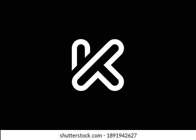 Minimal elegant monogram art logo. Outstanding professional trendy awesome artistic KT TK initial based Alphabet icon logo. Premium Business logo. White color on black background.