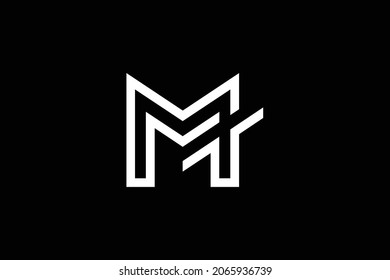 Minimal elegant monogram art logo. Outstanding professional trendy awesome artistic MT TM  initial based Alphabet icon logo. Premium Business logo. White color on black background.