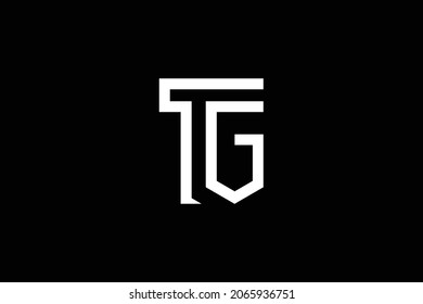 Mínimo y elegante logotipo de arte en monograma. Destacado profesional de moda impresionante artística TG GT inicial basado en el logotipo del icono del Alfabeto. Logo de Premium Business. Color blanco sobre fondo negro.