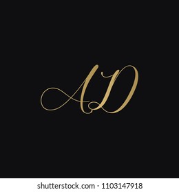 Minimal luxurious elegant AD DA A D artistic black and golden color initial based letter icon logo.