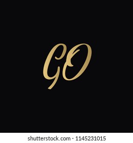 Minimal Luxury GO Initial Based Golden and Black color logo