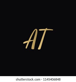 Minimal Luxury AT Initial Based Golden and Black color logo