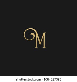 Minimal Luxury M Initial Based Golden and Black color logo