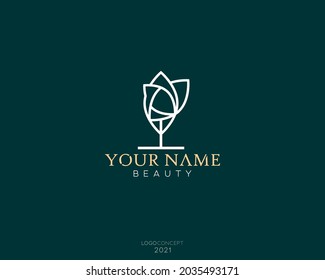Minimal nature logo design with leaf for modern identity, emblem or symbol isolated on dark green background.