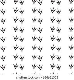 Minimal seamless pattern with dinosaur foots. Black and white colors. Vector illustration.