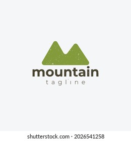 Minimal vector logo in a modern style. Top of the mountain in the form of letter M