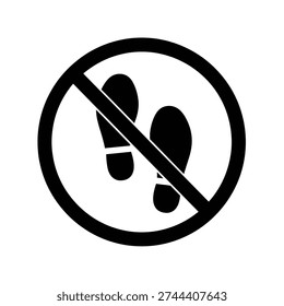 Minimal vector-style illustration of two footprints inside a circular prohibition sign with a diagonal slash. Bold black silhouette design isolated on a white background, representing no pedestrian access, restricted walking area, or do not enter on foot warning. Ideal for safety signage, traffic control systems, construction zones, and restricted area indicators.