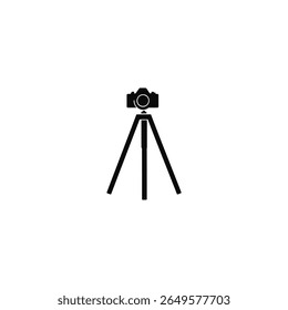 Minimalist black camera icon rests stably on a tripod, isolated against a clean white background. Simplicity and photographic equipment come together in a vector design.