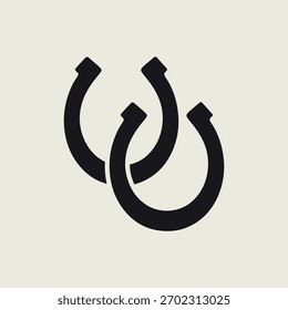 Minimalist black featuring two interlocked horseshoes on a light background Bold simple icon symbolizes good luck fortune protection and is often associated with equestrian and country themes Vector