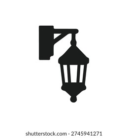 A minimalist black and white vector icon of a classic outdoor wall lantern. This simple silhouette shows a vintage street light fixture on a bracket.