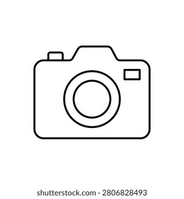A minimalist black and white vector icon featuring a front-facing view of a classic digital SLR (DSLR) or mirrorless camera body. This clean line art illustration outlines the main camera structure, an upper prism hump, a left shutter button, a right flash or sensor window, and a prominent center optical lens barrel. The graphic represents concepts such as professional photography, video production media, digital content creation, creative design studios, travel vlogging, snapshot gallery capturing, and multimedia technology equipment.