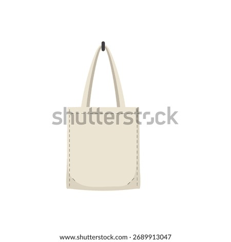 Minimalist blank canvas tote bag hanging on a hook, ready for custom branding or eco friendly design.