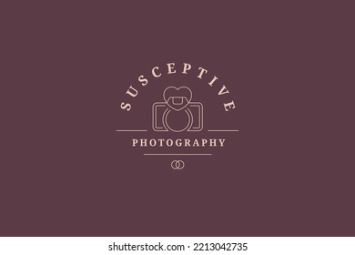 Minimalist business card wedding photographer line logo vector illustration. Monochrome professional photo video camera with heart and marriage rings romantic emblem brand identity with place for text