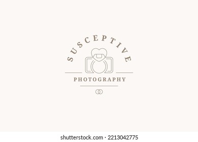 Minimalist business card wedding photographer line logo vector illustration. Monochrome professional photo video camera with heart and marriage rings romantic emblem brand identity with place for text