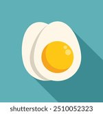 Minimalist flat lay image of a sliced hard boiled egg showing the yolk, isolated on a blue background with a long shadow