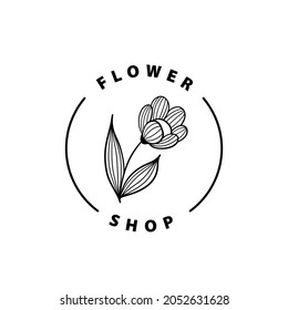 Minimalist flower shop logo design. Line art floral element. Black and white ink illustration.