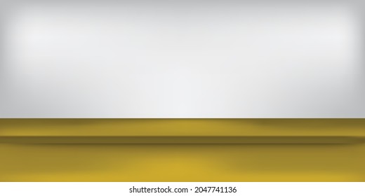 Minimalist golden table with a soft gray wall background, ideal for showcasing products or promotional displays in a clean and elegant setting