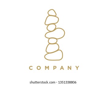 Minimalist illustration logo design mono line rock balancing in gold color.