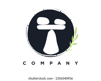 Minimalist illustration silhouette logo design stone balance in circle.
