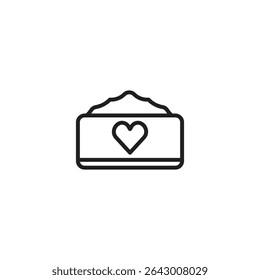 A minimalist line art icon of a rectangular box with frosting or whipped cream on top and a heart symbol on the front. Could represent a cake box or a gift of love.