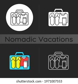 Minimalist mindset dark theme icon. Pack clothing in luggage. Apparel in suitcase. Nomadic lifestyle. Summer vacation. Linear white, simple glyph and RGB color styles. Isolated vector illustrations