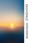 Minimalist ocean sunset background with soft blue and gold gradient for product display and serene nature concepts