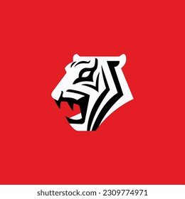 Minimalist oriental tiger logo in red background.