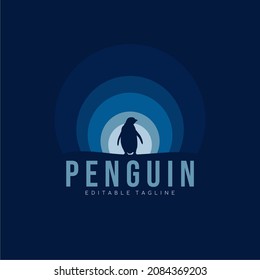 Minimalist penguin silhouette with blue gradient. Logo design. Vector illustration.