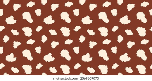 Minimalist seamless animal print, deer skin pattern with cream irregular textured spots on brown background for textiles, wallpapers, wrapping paper, fabric.