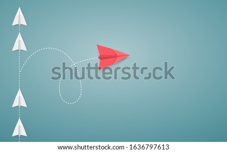 Minimalist stile red airplane changing direction and white ones. New idea, innovation and unique way concept