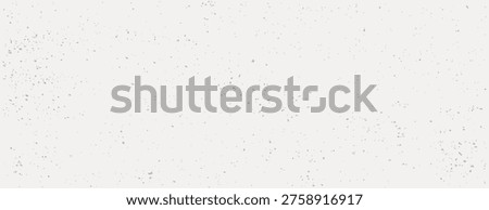 Minimalist vector background with a white canvas and scattered black speckles, creating a textured, vintage effect suitable for various design projects.