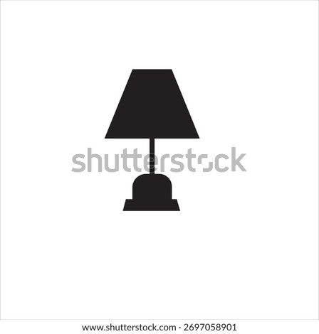 Minimalist vector icon of a table lamp or nightlight in a solid black silhouette.Simple graphic symbol for light,furniture,or home decor