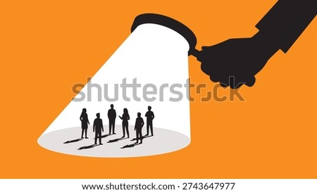A minimalist vector illustration featuring a large hand holding a magnifying glass that casts a bright white light beam onto a group of small people silhouettes against a vibrant orange background.
