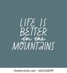 Minimalist vector lettering. Inspirational hand drawn inscription on blue background. Life Is Better In The Mountains. Hand drawn quote.
