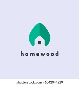 Minimalist vector logo of house and tree leaf. Eco house concept.