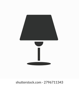 A minimalistic black silhouette of a table lamp with shade and base.