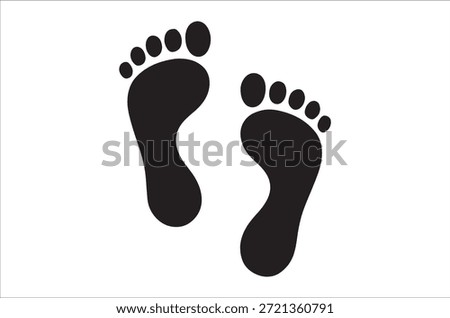 A minimalistic black and white image featuring a pair of human footprints.