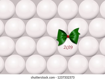 A minimalistic Christmas card with a Christmas tree balls with a green bow.
