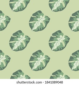Minimalistic monstera leaf seamless pattern. Hand drawn pastel green tropical ornament on beige background. Decorative backdrop for fabric design, textile print, wrapping, cover. Vector illustration