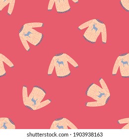 Minimalistic seamless pattern with decorative light orange sweater print. Pink background. Vector illustration for seasonal textile prints, fabric, banners, backdrops and wallpapers.