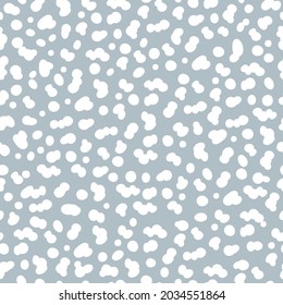 Minimalistic seamless pattern with white spotted or snow on blue background. Modern simple universal design. Vector illustration
