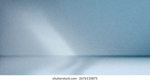Minimalistic simple abstract light blue background for product presentation. Shadow and light from windows on wall grainy.