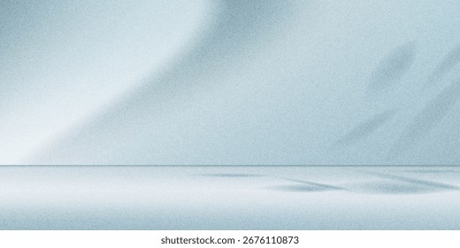 Minimalistic simple background for product presentation. Shadow from plant foliage and light on blue wall.
