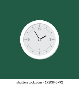 minimalistic simple wall clock with straight arrows. The dial is well recognized, correctly aligned by degrees, can be used in real watches. white on a green wall