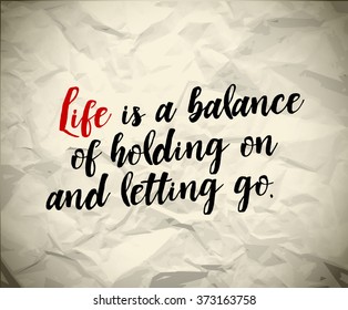 Minimalistic text lettering of an inspirational saying Life is a balance of holding on and letting go