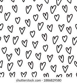 Minimalists seamless pattern with doodle hearts. Perfect for Scandinavian style graphics and illustrations, wrapping paper, wallpapers, textile. Valentine's day 
theme pattern