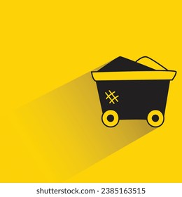 mining cart with shadow on yellow background